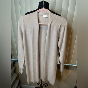 Cyrus long open-front cardigan in a light beige/tan color size Med